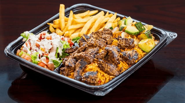 Steak Tips Over Rice.